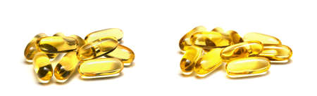 fish oil capsules isolated on whiteの写真素材