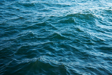 Blue sea water background textureの写真素材