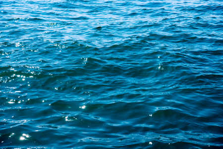 Blue sea water background textureの写真素材