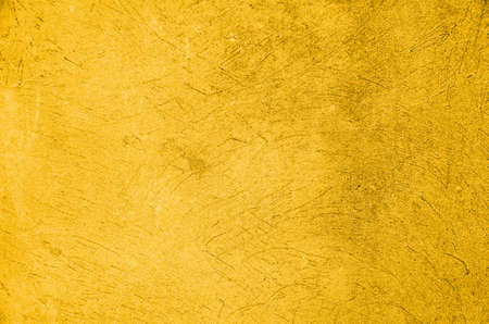 old yellow wall background textureの写真素材
