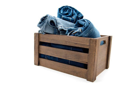 jeans over old grunge wood boxの写真素材