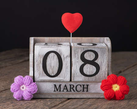 8 March Happy Women's Day message with wooden block calendar
