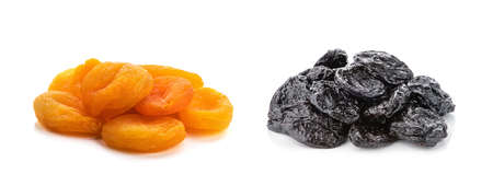 Dried prunes and dried apricots, isolated on white background. Collage of different dried fruits.の写真素材