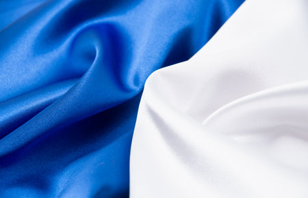 white and blue satin fabric for backgroundの写真素材