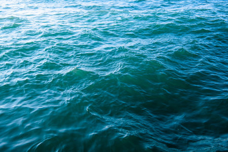 Blue sea water background textureの写真素材