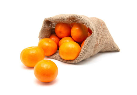 ripe juicy tangerine on a white background.の写真素材