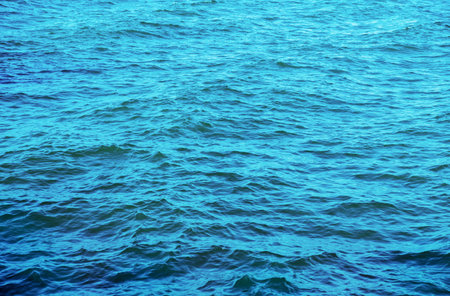 Blue sea water background textureの写真素材
