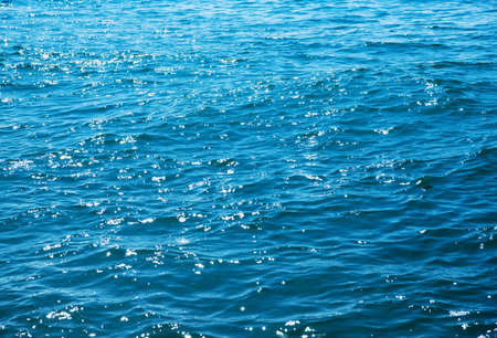 Blue sea water background textureの写真素材