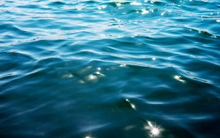 Blue sea water background textureの写真素材
