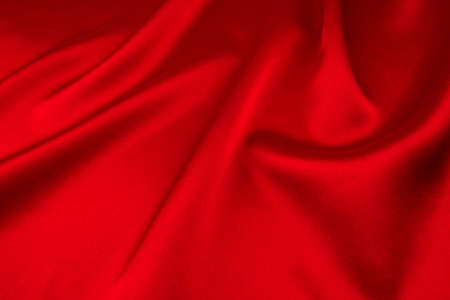red satin or silk fabric as backgroundの写真素材