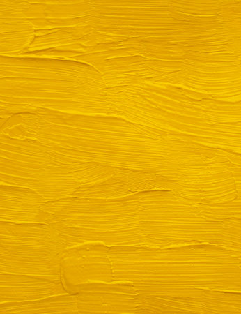 artists oil paints yellow background textureの写真素材