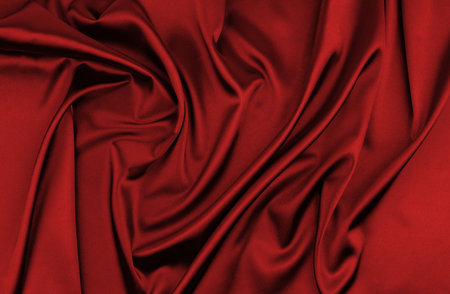 red satin or silk fabric as backgroundの写真素材