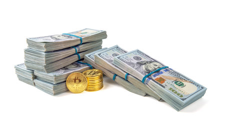 Gold bitcoin coin of dollar bills isolated on white background cryptocurrency mining concept.の写真素材