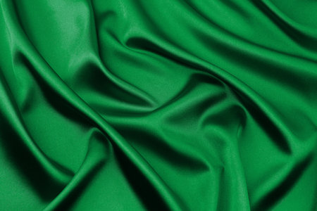 Green satin fabric as backgroundの写真素材