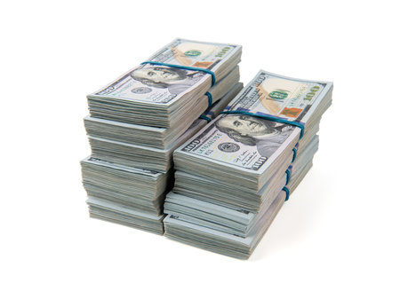 New design dollar bundles isolated on white background.の写真素材
