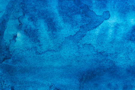 Hand painted blue watercolor background.の写真素材