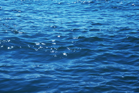 Blue sea water background textureの写真素材