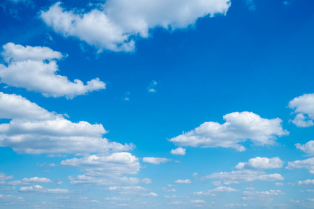 blue sky background with white cloudsの写真素材