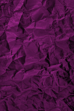 Pink crumpled paper texture background.の写真素材