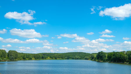 landscape with river and blue skyの写真素材