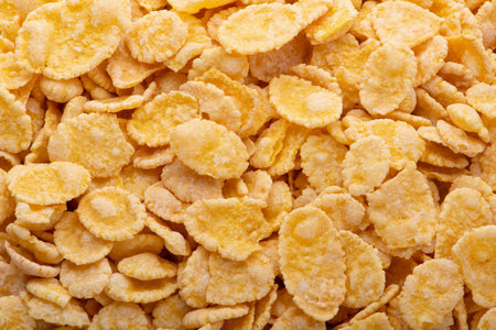Corn flakes background and texture, cornflake cereal box for morning breakfast.の写真素材