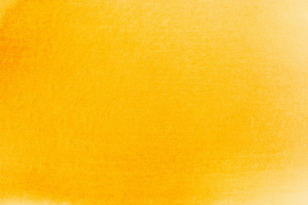 Hand painted yellow watercolor background.の写真素材