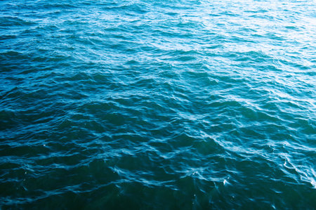 Blue sea water background textureの写真素材