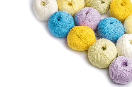 Colorful yarn balls isolated on white
