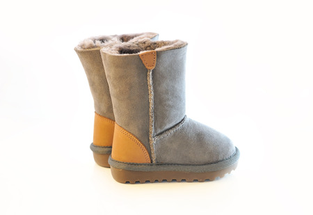 Kids warm winter boots in gray fur.