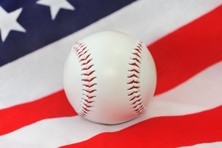 Baseball ball on a background of the American flag の写真素材