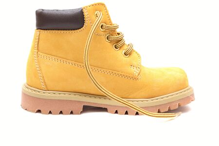 Yellow chamois shoe isolated over white