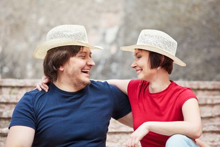 Happy man and woman looking each otherの写真素材