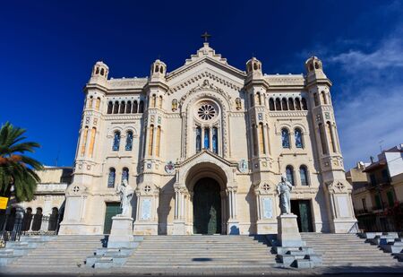 Wide-angle shot of frontal view of Duomo Cathedral in neo-romanesque style of Reggio Calabria in the Southern Italyの写真素材