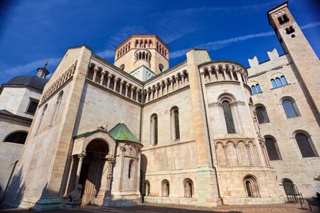 Rear view of San Vigilius cathedral of XII-XIV in main square of Trento built of pink marble of Verona in early gothic styleの写真素材