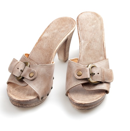 Leather woman clogs isolated on whiteの写真素材