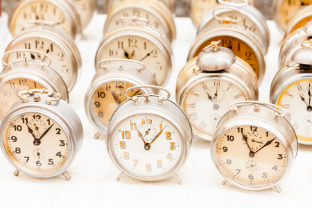 Group of vintage clocks at market