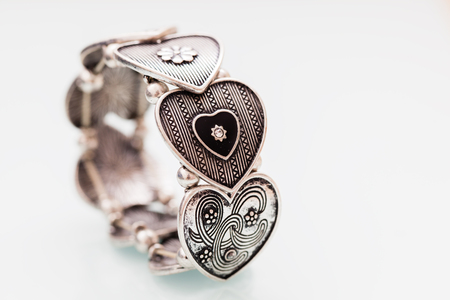 Metallic bracelet jewelry engraved heart stylish accessoryの写真素材
