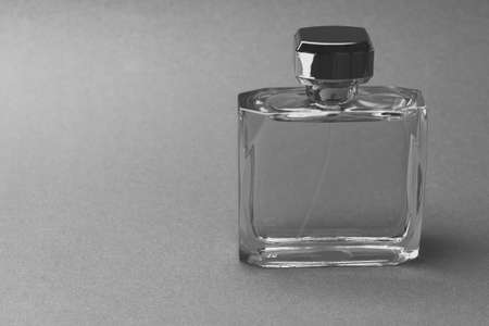 Male perfume bottle close up, black and white conceptual fashion photo. With place for your text.の写真素材