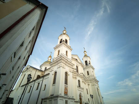 Vitebsk, Belarus-August 2021: View of the Holy Dormition Cathedral against the backdrop of a...