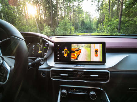 Minsk, Belarus - June 2022: Geely SUV media system screen Geely Coolray car.
