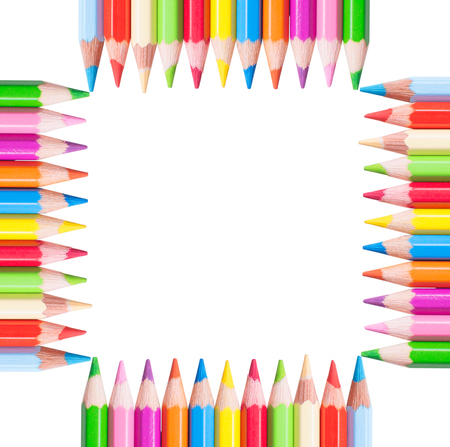 square frame of color pencils isolated on a white background.の写真素材