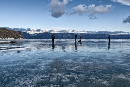 people stand on the ice of lake Baikal and take picturesのeditorial素材