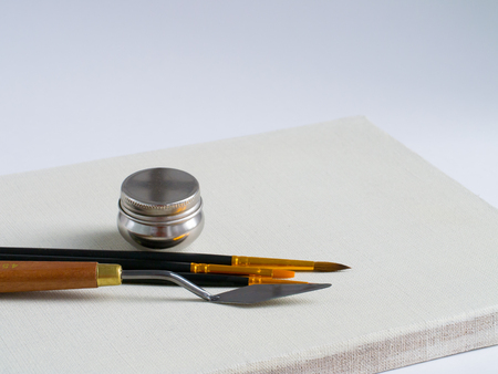 Paint tools - brush, spatula, steel  oiler on canvas for art and creationの写真素材