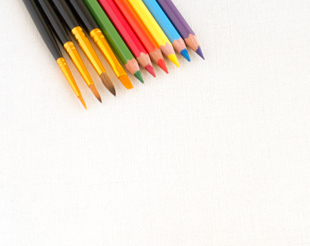 Art brush and pencil for painting on canvas backgroundの写真素材