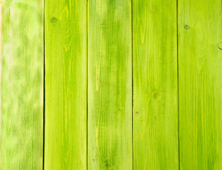 painted in green, wooden background from pine boardsの写真素材