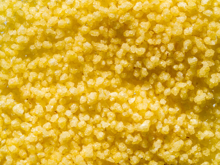 raw dry grains couscous, close-up, top viewの写真素材