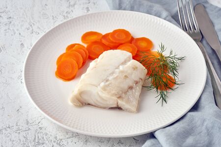 steamed codfish full of vitamins with carrot and dill, healthy diet, fodmap dash and paleoの写真素材