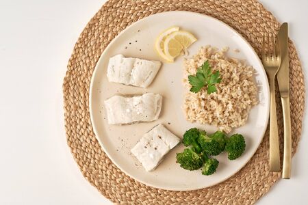 healthy meal full of vitamins and minerals, cod and rice with broccoli