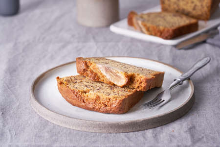 Banana bread. Cake with banana, traditional american cuisine. Slices of loaf in plate