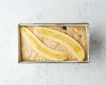 Homemade Banana bread. Dough for cake in pan loaf. Step by step recipe. Step 11.の写真素材